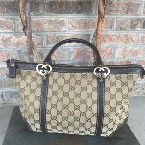 Classic Gucci Handbag - With original duffle bag